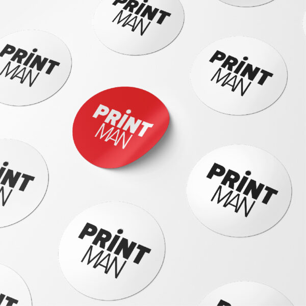Collection of round Printman logo buttons with one red button standing out