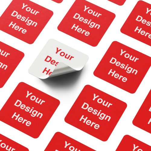 Red square sticker mockup sheet with 'Your Design Here' placeholders printed across the sheet, with one sticker being peeled up to show the adhesive backing; ideal for showcasing custom sticker printing templates.